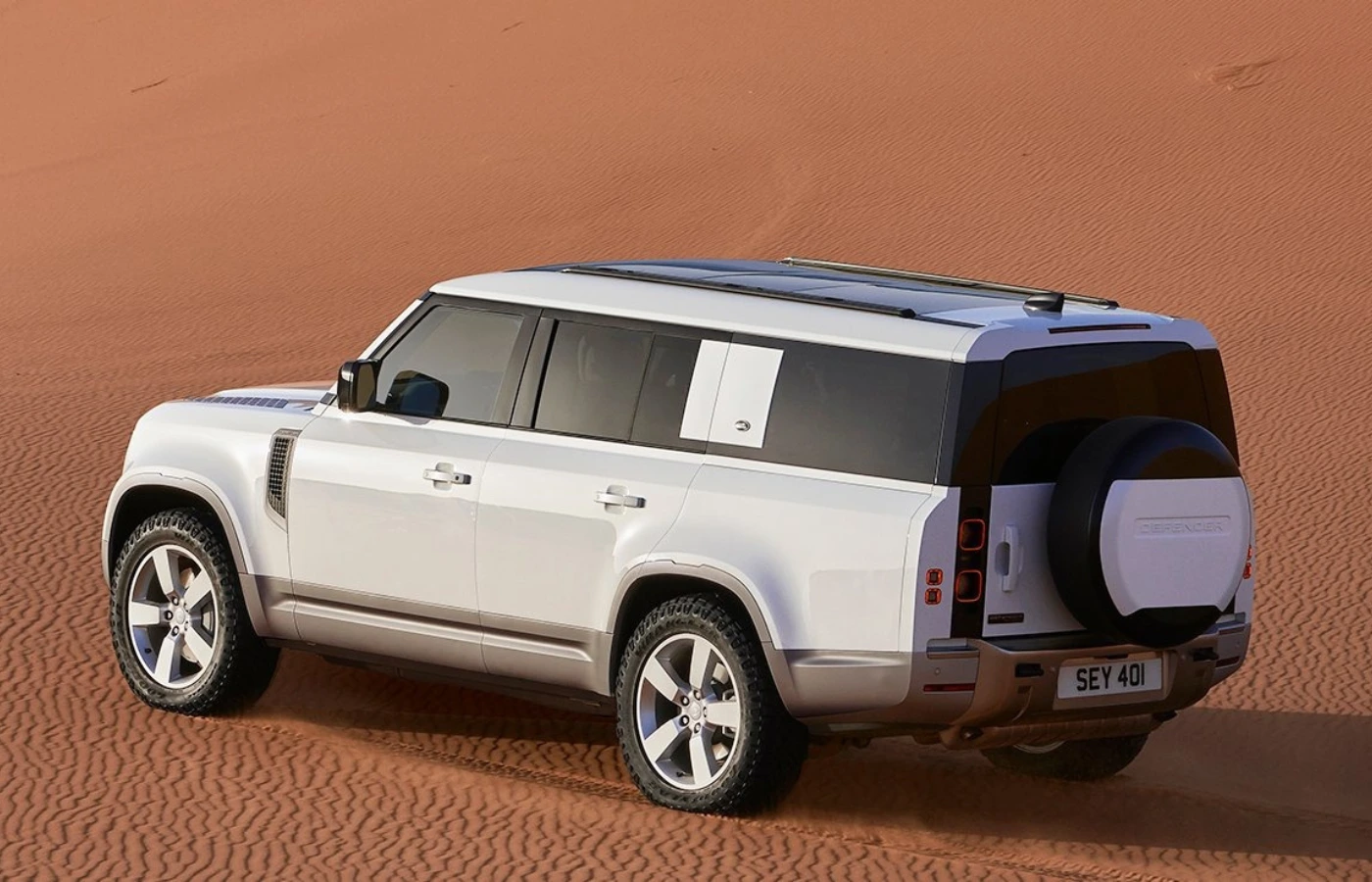 The Land Rover Defender will transition to an all-electric model by 2027. Featured Image